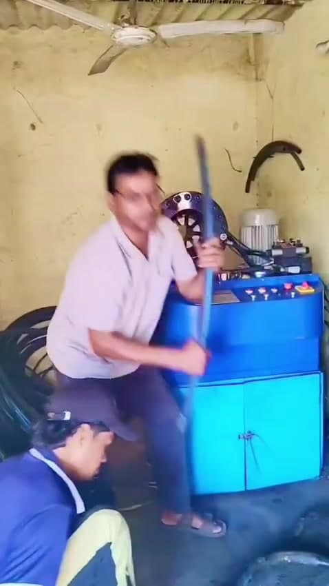 Hydraulic pipe crimping machine press in operation